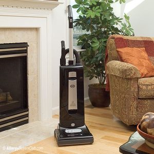 Black SEBO vacuum cleaner in a living room