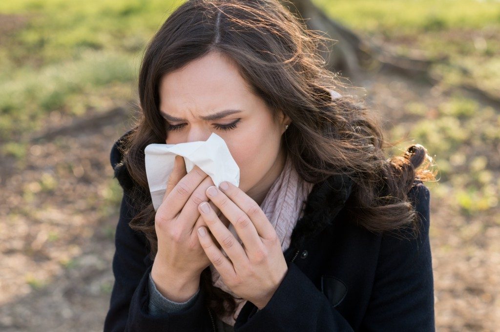 Sneezing Woman